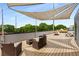 Wide shot of rooftop deck, featuring contemporary outdoor furniture and a large sunshade for comfortable lounging at 417 E College Ave # 302, Decatur, GA 30030