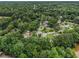An aerial view of a residential area with tree-lined streets and well-maintained homes at 4835 Kellys Mill Nw Dr, Lilburn, GA 30047