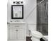 Stylish bathroom with modern fixtures, a vanity, and a tiled glass shower at 4835 Kellys Mill Nw Dr, Lilburn, GA 30047