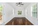 Bright sunroom with ample natural light and access to an outdoor deck at 4835 Kellys Mill Nw Dr, Lilburn, GA 30047