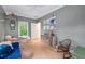 Cozy bedroom featuring hardwood floors, natural light, and a whimsical solar system mobile at 635 Holcomb Bridge Rd, Norcross, GA 30071