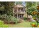 Charming home with a two-story porch and lush landscaping in a desirable neighborhood at 635 Holcomb Bridge Rd, Norcross, GA 30071