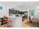 Stylish kitchen with sleek countertops, stainless steel appliances, and custom green cabinetry at 635 Holcomb Bridge Rd, Norcross, GA 30071