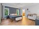 Inviting main bedroom with hardwood floors, ensuite bath and views of the backyard at 635 Holcomb Bridge Rd, Norcross, GA 30071