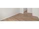 Bright, airy living room featuring wood flooring and white trim for a modern, clean look at 1649 Tielman Way, Snellville, GA 30078