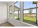 Bright room with three large windows offering scenic neighborhood views at 1649 Tielman Way, Snellville, GA 30078