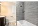 Modern bathroom featuring a stylish tiled shower and updated vanity at 1856 Austell Sw Cir, Marietta, GA 30060
