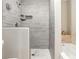 Modern bathroom featuring a stylish tiled shower and updated fixtures at 1856 Austell Sw Cir, Marietta, GA 30060