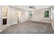 Spacious bedroom featuring carpet, neutral walls, and two windows at 1856 Austell Sw Cir, Marietta, GA 30060