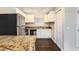 Modern kitchen with granite countertops and stainless steel appliances at 1856 Austell Sw Cir, Marietta, GA 30060
