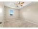 Comfortable bedroom with tray ceiling, neutral carpet, and natural light at 3227 Ivy Lake Ct, Buford, GA 30519
