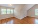 A spacious bedroom featuring hardwood floors and two windows at 3404 Orchard St, Hapeville, GA 30354