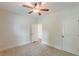 This bedroom features neutral walls, carpet flooring, and ceiling fan at 3404 Orchard St, Hapeville, GA 30354