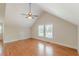 Spacious bedroom with hardwood floors and two windows at 3404 Orchard St, Hapeville, GA 30354