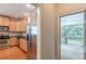 Bright kitchen with stainless steel appliances and access to the screened porch at 3404 Orchard St, Hapeville, GA 30354