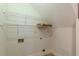 A storage space with shelving and a power outlet at 3404 Orchard St, Hapeville, GA 30354