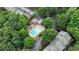 Aerial view of community pool, surrounded by lush landscaping and mature trees at 433 The North Chace, Atlanta, GA 30328