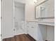 Bathroom with white cabinetry, vanity and neutral countertops at 433 The North Chace, Atlanta, GA 30328