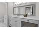 Bathroom featuring a white vanity with sink, mirror, and tile flooring at 433 The North Chace, Atlanta, GA 30328