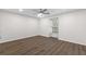 Bright bedroom features hardwood floors, ceiling fan and a window providing natural light at 433 The North Chace, Atlanta, GA 30328
