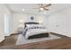 Inviting bedroom with a ceiling fan, plush bedding, and closet, offering a relaxing retreat at 433 The North Chace, Atlanta, GA 30328