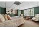 Spacious bedroom with built-in shelves and two large windows at 1042 Bailey Rd, Woodstock, GA 30188