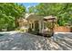 Inviting covered deck and pergola create a relaxing outdoor space at 1042 Bailey Rd, Woodstock, GA 30188