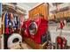 Unique laundry room boasting striking red washer and dryer, alongside ample storage and organization solutions at 1042 Bailey Rd, Woodstock, GA 30188