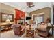 Comfortable living room with a fireplace, plush seating, and ample natural light at 1042 Bailey Rd, Woodstock, GA 30188