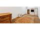Finished basement playroom with playhouse, ladder, and storage at 1042 Bailey Rd, Woodstock, GA 30188