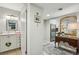 Bright bathroom view from hall with ample counter space and neutral color scheme at 3650 Ashford Dunwoody Ne Rd # 1024, Atlanta, GA 30319