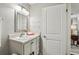 Clean bathroom with a stylish vanity, modern mirror, and ample lighting at 3650 Ashford Dunwoody Ne Rd # 1024, Atlanta, GA 30319