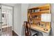 Charming bedroom with vanity desk, chair, and view into the attached bathroom at 3650 Ashford Dunwoody Ne Rd # 1024, Atlanta, GA 30319