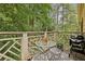 Charming outdoor deck with wooded views and grill, ideal for relaxation and outdoor cooking at 3650 Ashford Dunwoody Ne Rd # 1024, Atlanta, GA 30319