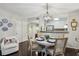 Dining area featuring hardwood floors, modern lighting and a view into the kitchen at 3650 Ashford Dunwoody Ne Rd # 1024, Atlanta, GA 30319