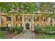 Traditional brick condo with mature trees and landscaping at 3650 Ashford Dunwoody Ne Rd # 1024, Atlanta, GA 30319