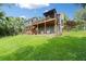 Home featuring two decks and a patio offering ample space for outdoor living and entertainment at 1400 Land Rd, Canton, GA 30114