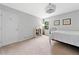 Bright bedroom featuring neutral walls, a window, and ample space for a cozy retreat at 1400 Land Rd, Canton, GA 30114