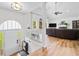 Inviting foyer with hardwood floors, leading to a bright living area at 1400 Land Rd, Canton, GA 30114