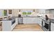Well-appointed kitchen offers modern appliances and sleek countertops for culinary enthusiasts at 1400 Land Rd, Canton, GA 30114