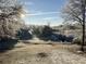 Beautiful winter landscape with frost-covered trees and a view of a meadow at 1400 Land Rd, Canton, GA 30114
