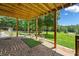 Outdoor area featuring a gravel base and porch swings, perfect for relaxing and enjoying the view at 1400 Land Rd, Canton, GA 30114