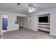 Carpeted living room featuring a TV, kitchenette and bathroom at 3348 Summit Turf Ln, Snellville, GA 30078