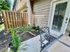 Cozy back patio offers a dining table, landscaping and a privacy fence at 3534 Clancy Way, Smyrna, GA 30080