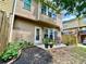 Outdoor patio area with a dining table surrounded by green landscaping at 3534 Clancy Way, Smyrna, GA 30080