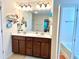 Bathroom featuring double sinks, vanity, and framed mirror at 3534 Clancy Way, Smyrna, GA 30080