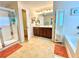 Bright bathroom with double vanity, framed mirrors, and separate shower at 3534 Clancy Way, Smyrna, GA 30080