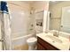 Functional bathroom featuring a shower-tub combo, toilet, and vanity with ample storage and mirror at 3534 Clancy Way, Smyrna, GA 30080