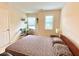 Bright bedroom with large windows and comfortable bed, perfect for relaxing and unwinding at 3534 Clancy Way, Smyrna, GA 30080