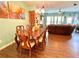 Beautiful dining room with hardwood floors, large table, and cozy living space at 3534 Clancy Way, Smyrna, GA 30080